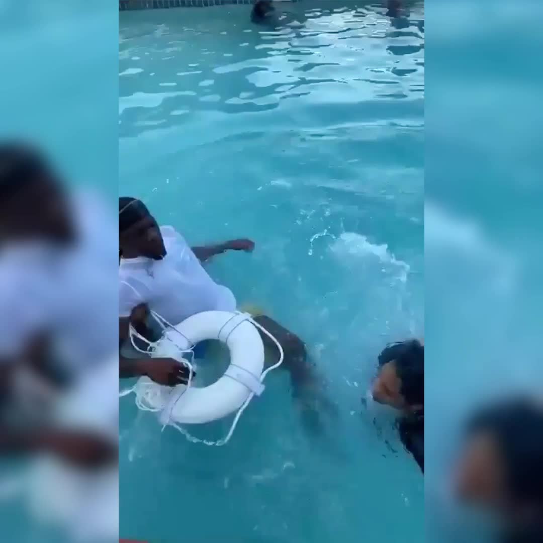 Man in wheelchair jumps in pool
