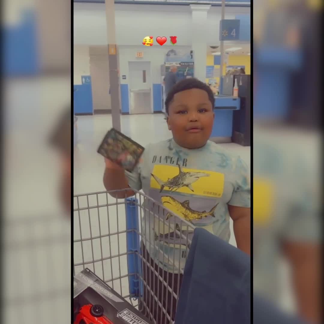 Little boy doesn't want to spend money on toy